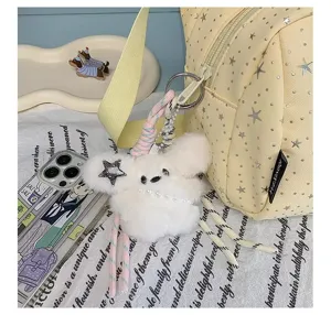 Cute yellow star pattern crossbody bag for women with fluffy plush charm pendant.
