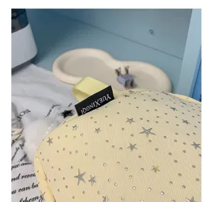 Stylish light yellow star pattern crossbody shoulder bag, casual everyday fashion accessory.