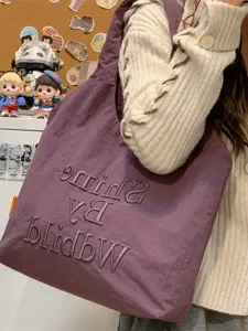 Casual purple canvas tote bag for women, stylish lightweight daily commuter shoulder bag.