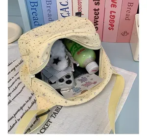 Canvas star crossbody bag interior detail showing large capacity for daily cute accessories.