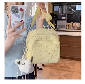 Lightweight star print cross-body bag for women, trendy casual canvas shoulder bag.