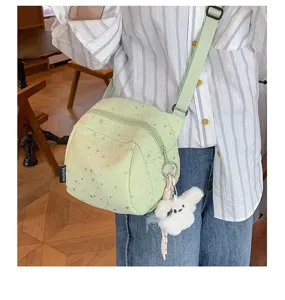 Light green star crossbody bag for women, casual lightweight shoulder bag with cute plush charm.
