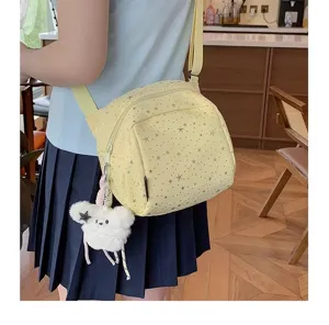 Casual star print crossbody bag for teen girls with cute bear pendant, lightweight shoulder bag.