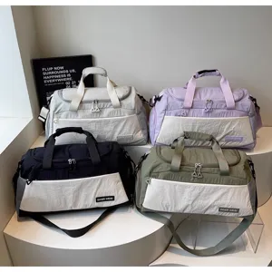 Lightweight large capacity sports gym duffel bag, versatile travel storage bag for women and daily use.