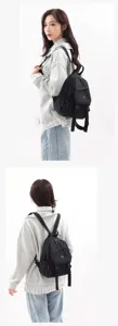 Zaino piccolo nero casual da donna e uomo, borsa scolastica alla moda per viaggi quotidiani