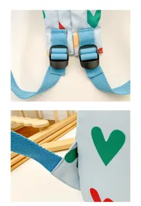 Light blue cute heart print mini backpack detail with adjustable straps for kids and daily use.