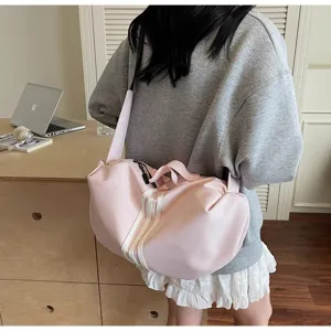Details of the light pink sports duffel bag, large capacity casual travel and yoga gym bag.