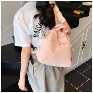 Pink canvas casual backpack for women, stylish minimalist travel chest bag and daily student crossbody.