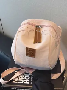 Sac bandoulière coquille en nylon rose décontracté pour femme, sac léger avec fermeture.