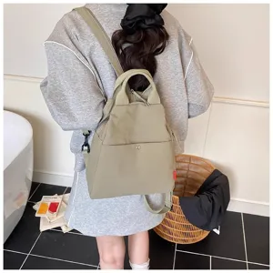 Korean minimalist women casual backpack in light green, perfect for student travel and daily use.