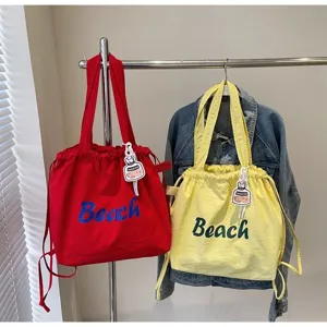 Sac bandoulière en nylon avec cordon et lettres, grand cabas décontracté pour femme.
