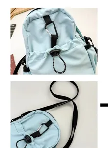 Lightweight blue mini backpack casual crossbody bag with carabiner and adjustable straps.