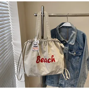Sac a bandouliere en nylon style coreen sac a dos fourre-tout cordon de serrage decontracte
