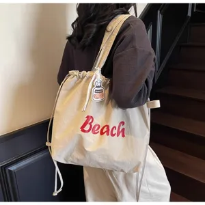 Sac à bandoulière décontracté en nylon avec cordon et impression de lettres Beach tendance.