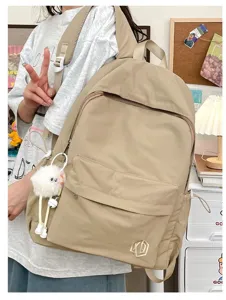 Casual solid color backpack for women students, lightweight travel daily school bag.