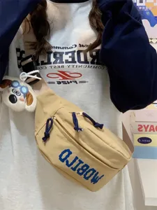 Casual canvas crossbody chest bag for men and women, stylish daily commuter fanny pack with cute dog charm.