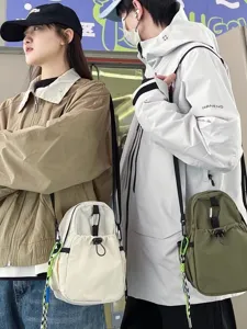 Casual nylon crossbody bag for men and women, lightweight mini shoulder pack for use.