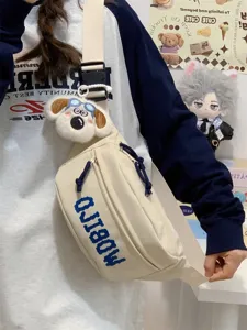 Casual canvas chest bag for women, stylish minimalist letter print crossbody bag with cute dog charm.