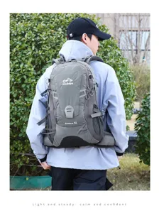 Outdoor 35L hiking backpack for men and women, lightweight waterproof travel rucksack for camping.