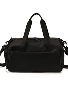 Compacte zwarte sporttas voor dames, casual waterdichte reisschoudertas met handvatten.