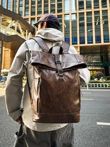 Vintage brown leather roll-top backpack for men and women, casual casual daypack travel bag.