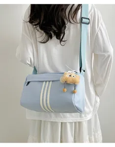 Casual large canvas crossbody bag for women, lightweight sports travel shoulder bag with 3 stripes.