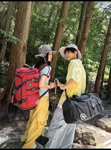 Large capacity travel backpack outdoor sports duffel bag for men and women hiking daily.