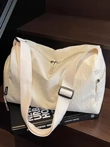 Casual large capacity travel duffel bag for women, lightweight sports gym shoulder bag.