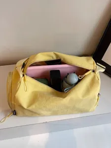 Large capacity yellow travel duffel bag, portable gym and yoga shoulder bag for women.