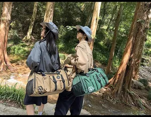 Outdoor travel duffel bag detail scene, showing multi-pocket design and large capacity in nature.
