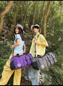 Large capacity travel duffel bag for men and women, waterproof sports gym bag with multiple pockets.