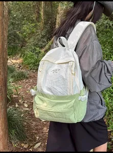 Lightweight outdoor travel backpack for women, large capacity casual daypack style.