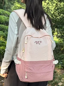Casual outdoor travel backpack for women, large capacity pink daypack for school and hiking