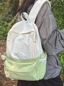 Lightweight outdoor travel backpack for women, large capacity stylish school bag for daily use.