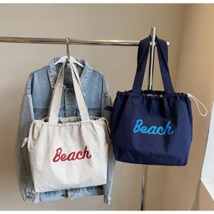 Bolso tote de lona informal para mujer, bolso de hombro de gran capacidad para viajes y uso diario.