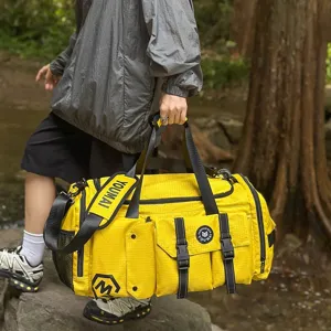 Water-resistant large capacity yellow travel duffel bag for fitness and sports.