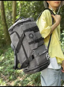 Large capacity travel backpack for men and women, waterproof grid duffel bag for sports.