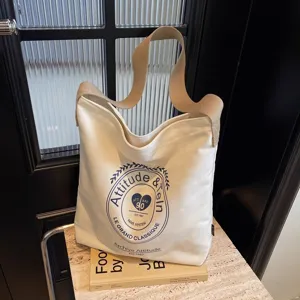 Large capacity canvas tote bag for women, casual single shoulder crossbody bag with vintage print.