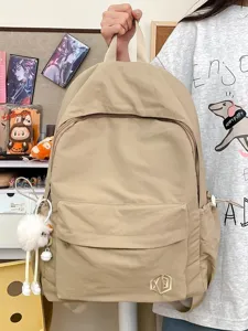 Minimalist solid color casual backpack for women and students, lightweight travel daypack.