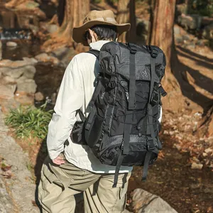 Men's large capacity tactical backpack for outdoor hiking, mountaineering, and travel use.