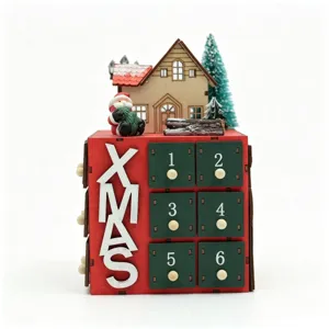 Detailed view of wooden Christmas advent calendar with miniature house, Santa, and numbered drawers.