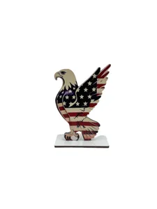Detailed view of wooden American flag bald eagle ornament for patriotic holiday desktop decor.