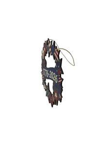 Independence Day patriotic wooden hanging sign detail, blue stars and stripes decor.