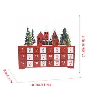 Wooden Christmas advent calendar with 24 drawers and German village scene for holiday decor.