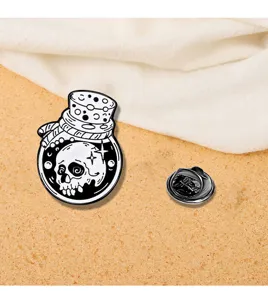 Close up detail shot of the gothic skull potion bottle enamel lapel pin with metal back clutch.