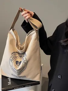 Large capacity canvas shoulder bag for women, casual crossbody messenger tote bag main view.