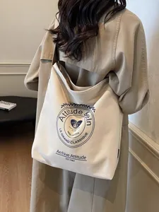 Canvas tote bag for women, large capacity shoulder crossbody bag, casual vintage style.