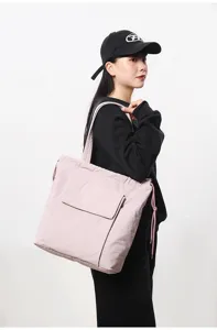 Roze minimalistische shopper met trekkoord, casual schoudertas voor dagelijks.