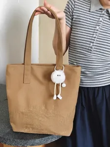 Casual vintage canvas tote bag for women, large capacity shoulder bag for daily commute and school.
