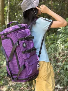 Large capacity purple grid travel backpack for men and women, outdoor hiking sports bag.